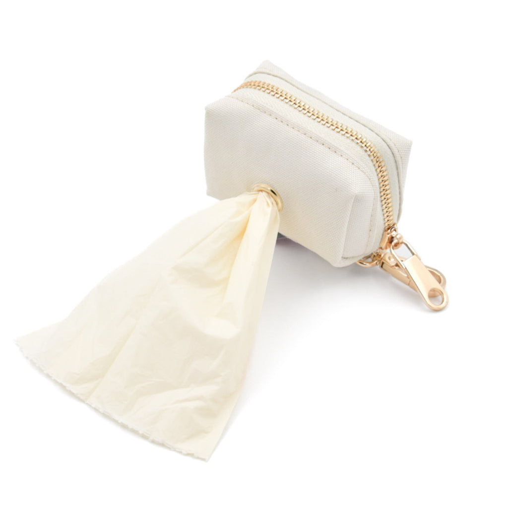 Fur Elise Le Poo Waste Bag Holder - Bone — holder with bag pulled through
